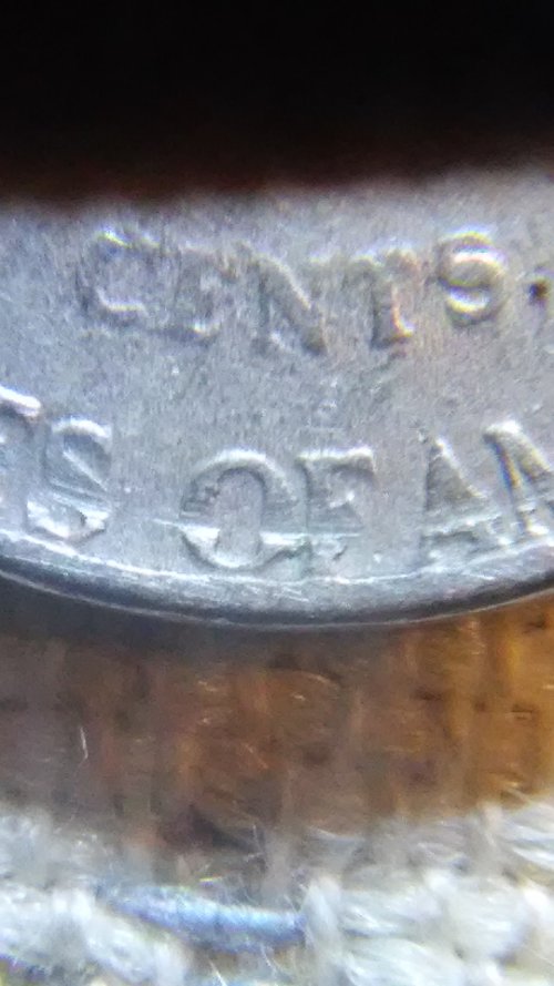 1971-D-Nickel-Has-A-Ring-Cut-Around-It-On-The-Reverse-Side